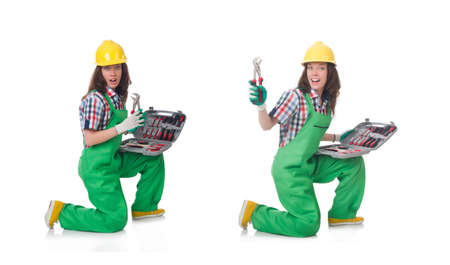 Young woman with toolkit on whiteの写真素材
