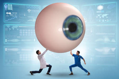 Doctor examining giant eye in medical concept