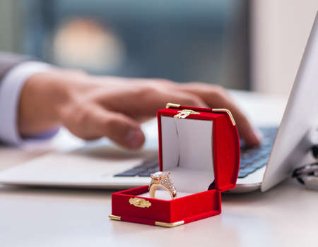 Romantic concept with man making marriage proposalの写真素材