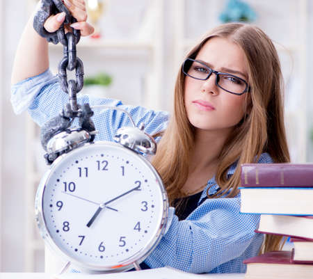 Young teenage female student preparing for exams at homeの写真素材