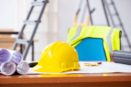 Young male architect working indoors on project