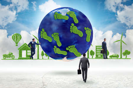 Carbon footprint concept with businessmanの写真素材