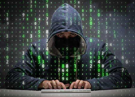 Young hacker in data security concept