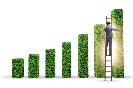 Businessman in green ecology growth conceptの写真素材