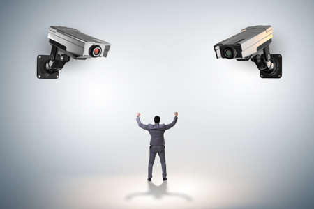 Cameras wathing man in spying concept