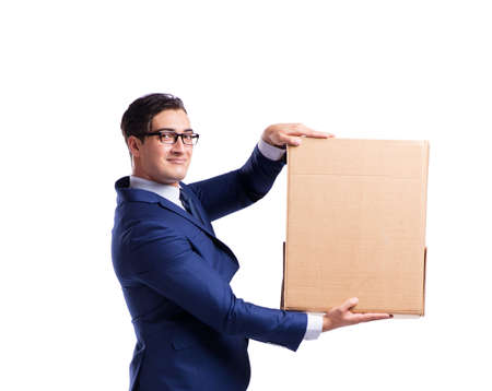 Businessman lifting box isolated on whiteの写真素材
