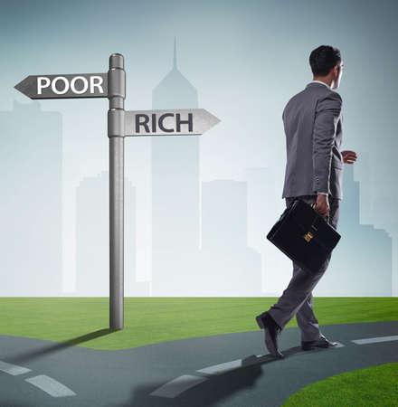 The businessman in difficult choice conceptの写真素材