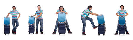 The young man travelling with suitcases isolated on whiteの写真素材