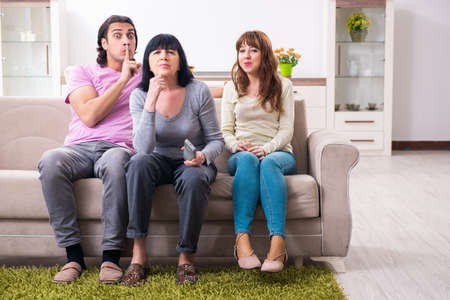 Young family and mother-in-law in family issues conceptの写真素材
