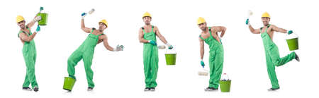 Painter in green coveralls on whiteの写真素材