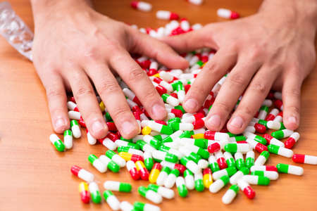 Young man suffering at home from fluの写真素材