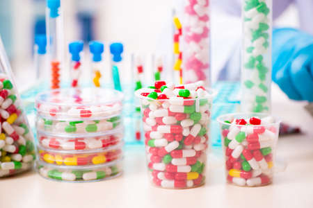 Young chemist in drug synthesis conceptの写真素材