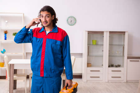 Young male carpenter working indoorsの写真素材