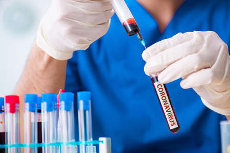 Doctor developing covid-19 vaccine in lab