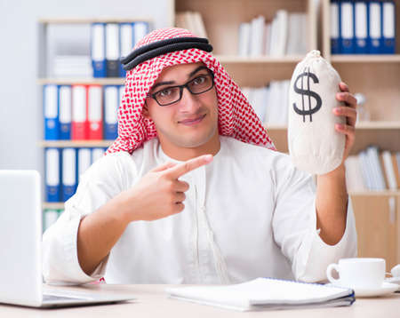 Young arab businessman in business conceptの写真素材