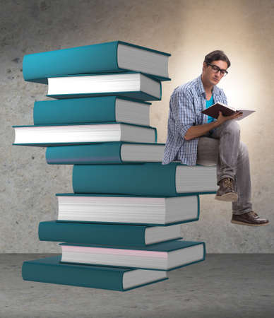Young male student in education conceptの写真素材