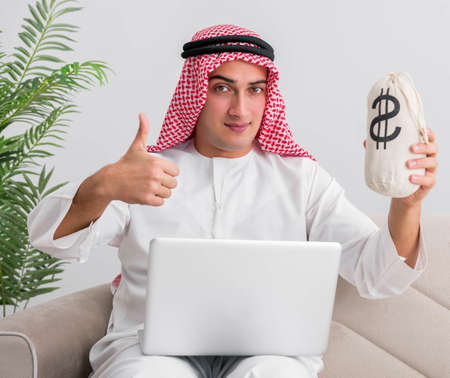 Young arab businessman in business conceptの写真素材