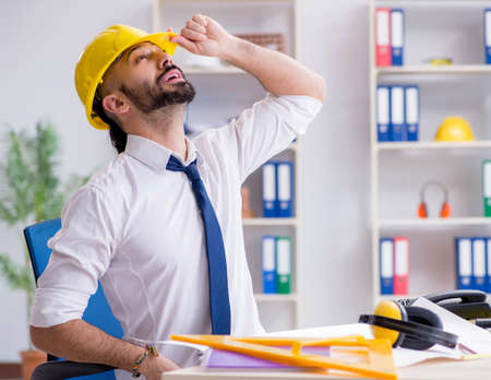 Architect working in his studio on new projectの写真素材