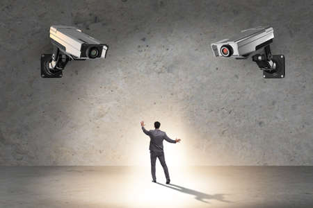 Cameras wathing man in the spying conceptの写真素材