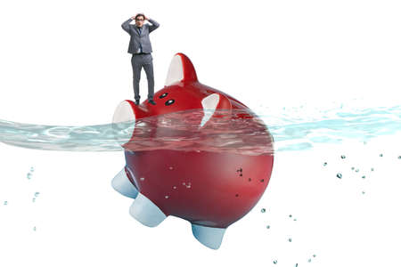 The businessman in debt concept with piggybankの写真素材