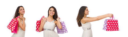 Woman with shopping bags isolated on white backgroundの写真素材