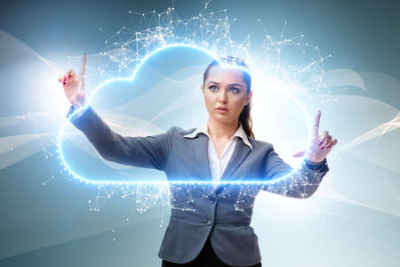 Cloud computing concept with woman pressing buttonsの写真素材