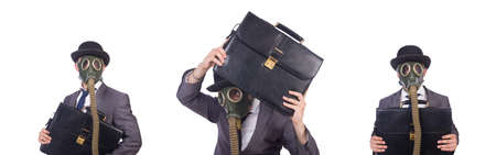 Businessman wearing gas mask isolated on whiteの写真素材