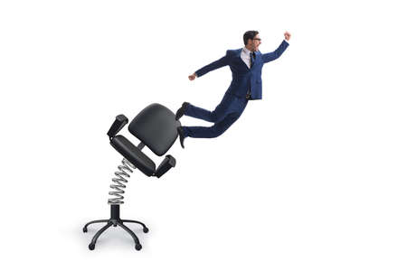 Promotion concept with businessman ejected from chairの写真素材