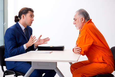 Old captive meeting with advocate in pre-trial detention