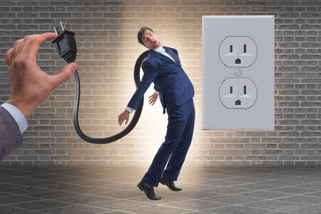 Businessman losing energy to work