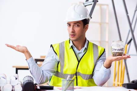 Young male architect working indoors