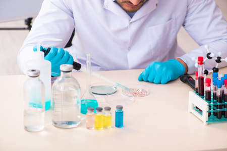 Young male doctor working in the lab