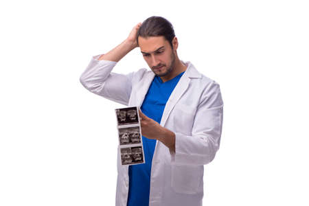 Young male doctor isolated on whiteの写真素材
