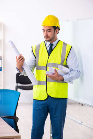 Young male architect in presentation conceptの写真素材