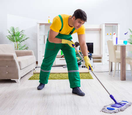 Professional cleaning contractor working at homeの写真素材