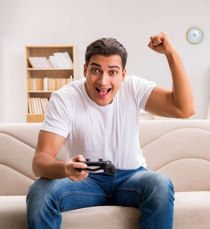 Man addicted to computer gamesの写真素材
