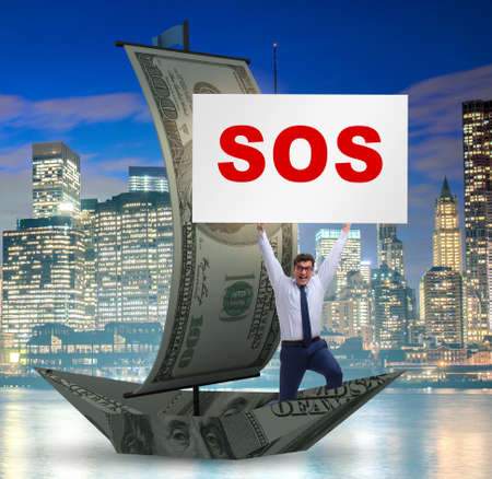 Businessman asking for help with SOS message on boat
