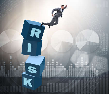 Businessman in risk and reward business conceptの写真素材