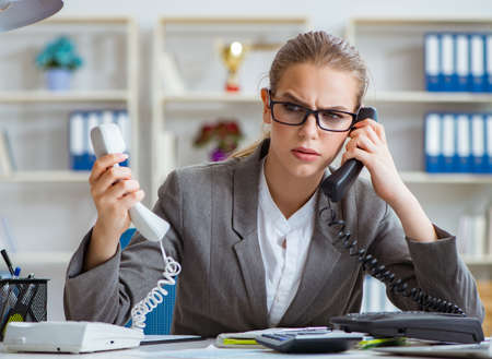 Young businesswoman accountant working in the officeの写真素材