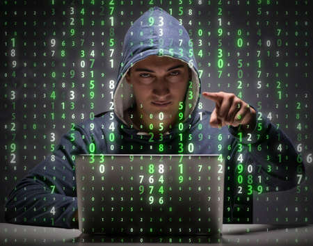 Young hacker in data security concept
