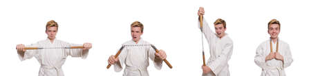 Funny karate fighter with nunchucks on whiteの写真素材
