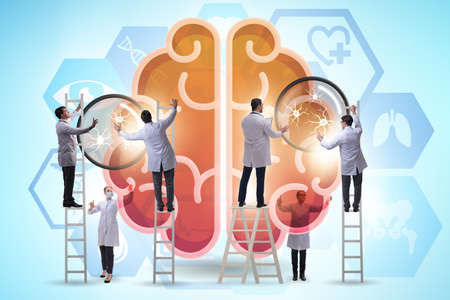 The team of doctors examining the human brain