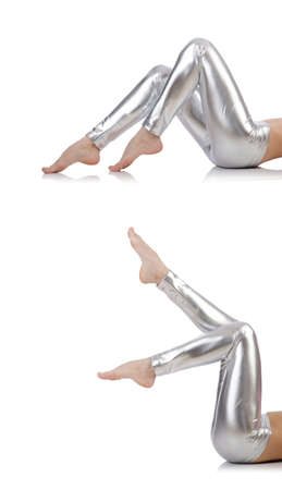 Woman legs with stockings on whiteの写真素材