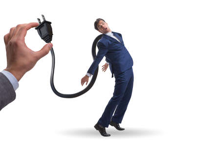 Businessman losing energy to work