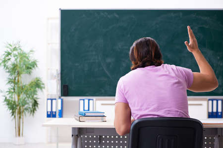 Young student in the classroomの写真素材