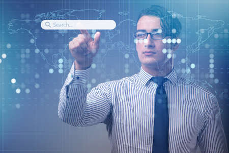 Search concept with businessman pressing button