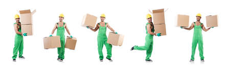 Man in green coveralls with boxesの写真素材