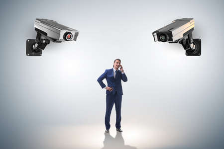 Cameras wathing man in spying conceptの写真素材