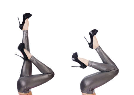 Woman legs with stockings on whiteの写真素材