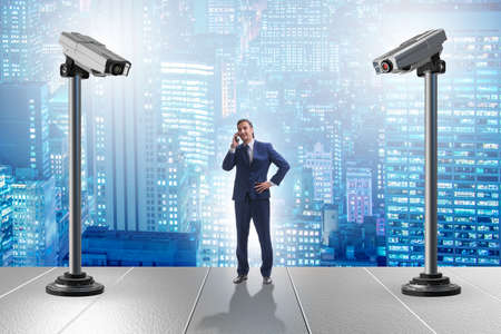 Cameras wathing man in the spying conceptの写真素材